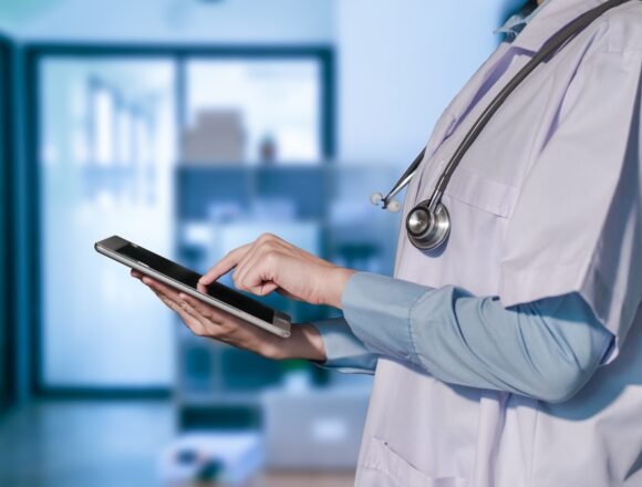 Healthcare,And,Medicine.,Doctor,Using,A,Digital,Tablet. Digital Marketing for Hospitals: Strategies to Grow Patient Engagement and Trust